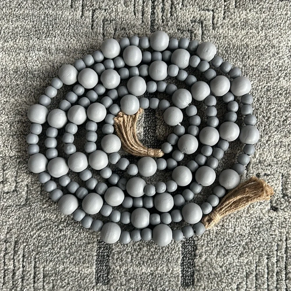 A set of two Gray Garland Christmas wooden beads brand new without box
